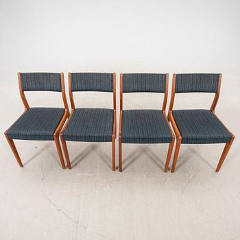 A set of four 1960s teak chairs.