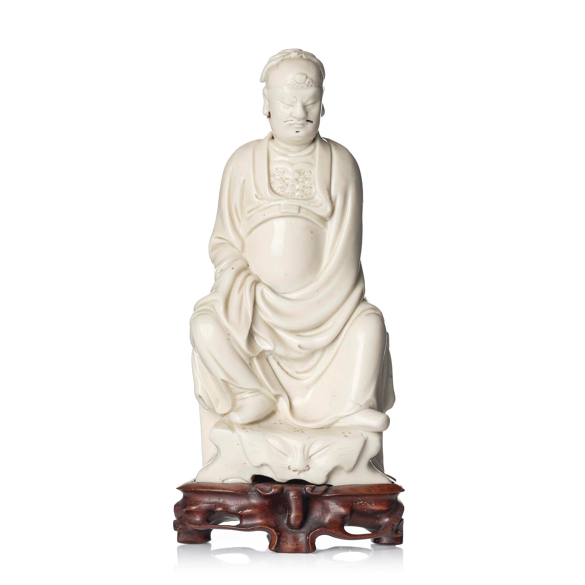 A blanc de chine figure of Guandi, Qing dynasty, 18th century.