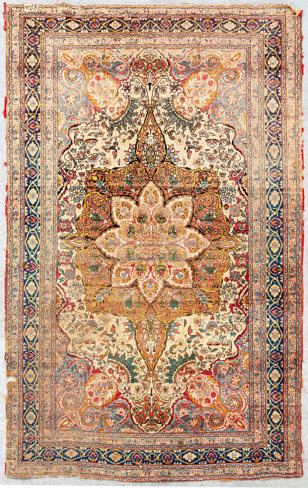 An antique Turkish /Hereke) signed carpet ca 200x121 cm.