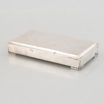 A Swedish silver beaker, an inkwell and a box, including Hugo Grun & Co, Stockholm 1948.