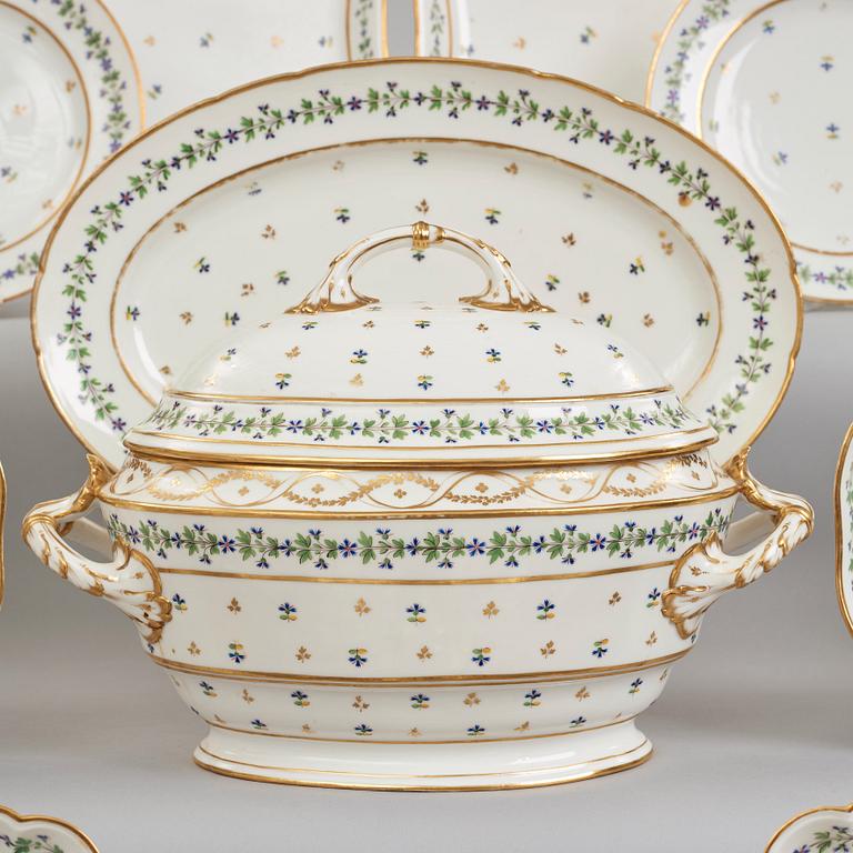 A French dinner service, circa 1800, some pieces marked M F Guerhard & Dahl.  (70 pieces).