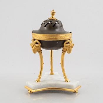 A French Empire ormolu and patinated bronze brûle-parfum, early 19th century.