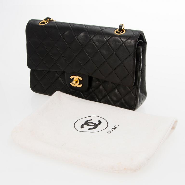 A Black Double Flap Bag.