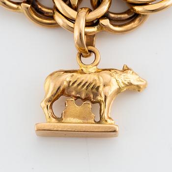 Bracelet with charm 18K gold.