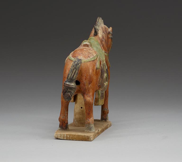 A glazed pottery figure of a horse, Ming dynasty.