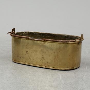 A 19th century brass fish pan.