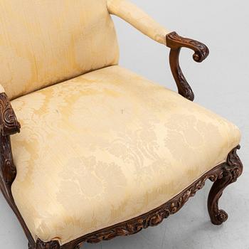 A carved mahogany George II armchair, 18th Century.