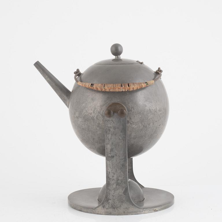 Nils Fougstedt, a tea kettle on stand model "A 942", Firma Svenskt Tenn, Stockholm 1929.