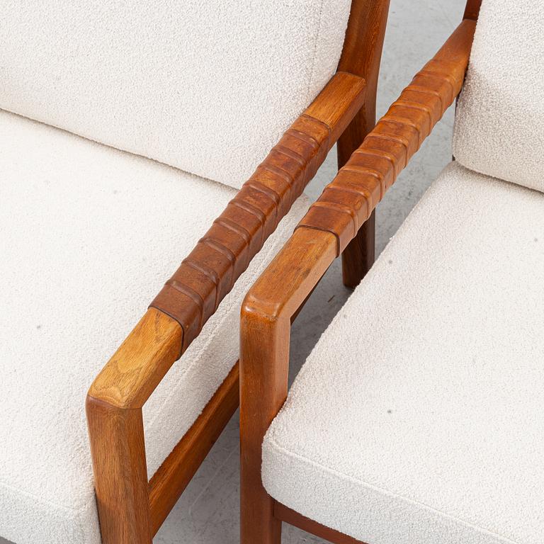 Carl Gustaf Hiort af Ornäs, a matched pair of 'Rialto' lounge chairs, Puunveisto Oy - Träsnideri Ab, Finland, mid-20th century.