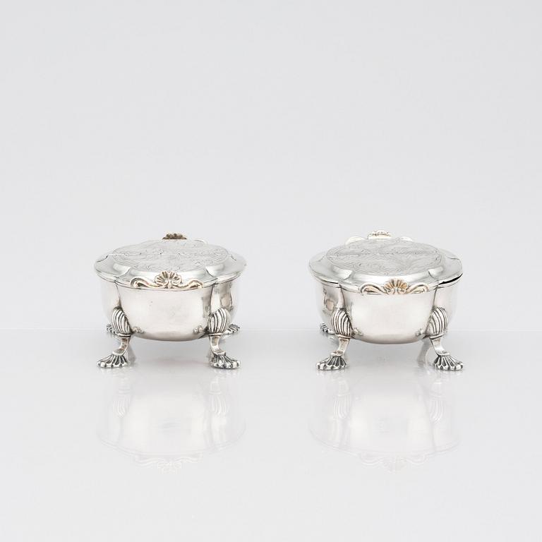 A pair of Latvian Rococo silver salt and pepper stands, marks of Johan Christian Henck (Henke), Riga 1768-80.