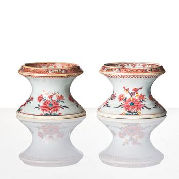 A pair of famille rose salts and a sauce boat, Qing dynasty, Qianlong (1736-95).