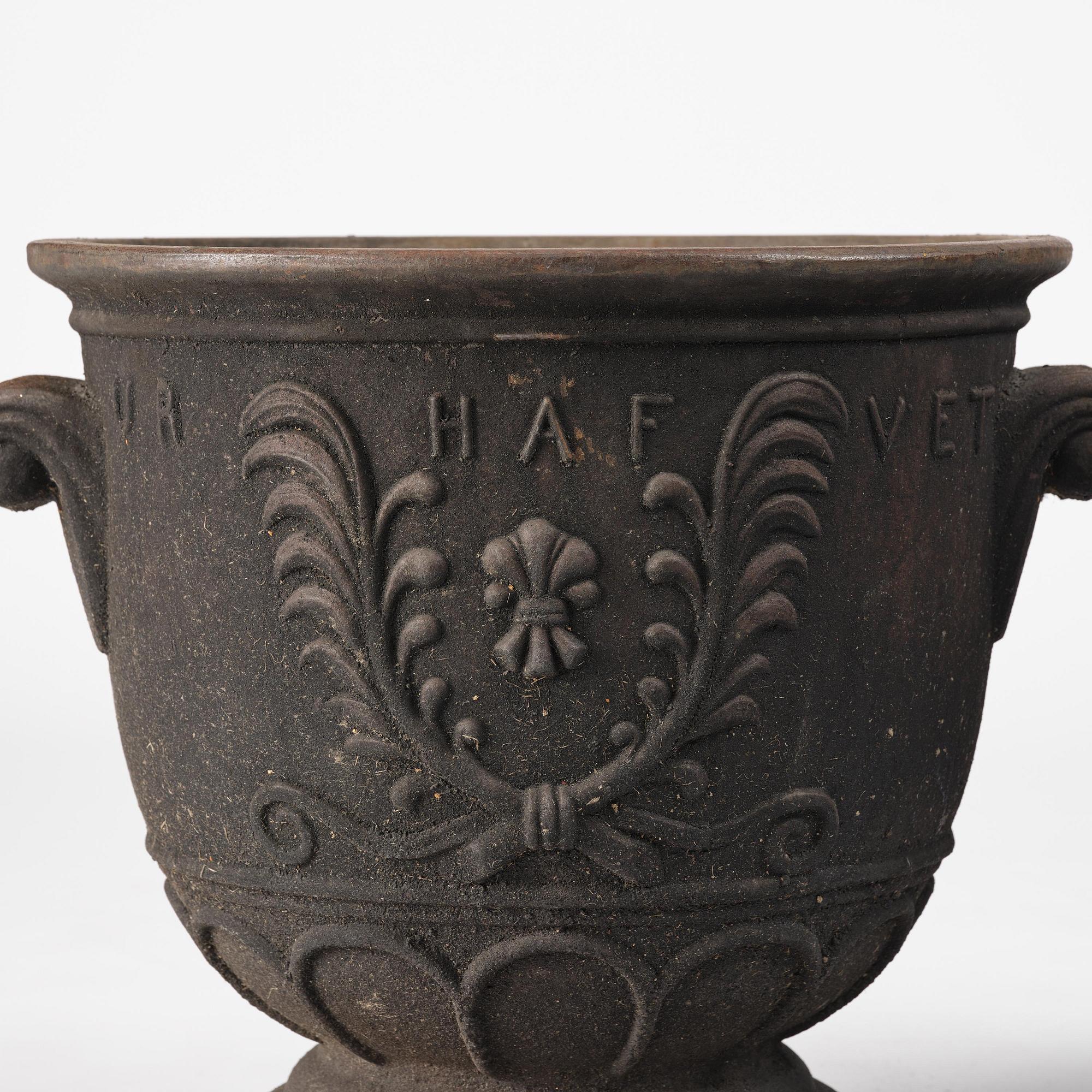 Ivar Johnsson, a pair of "Venus" cast iron urns, Näfveqvarns bruk, Swedish Grace.