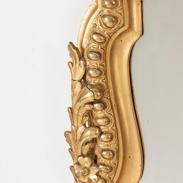 A Baroque style mirror, late 19th Century.