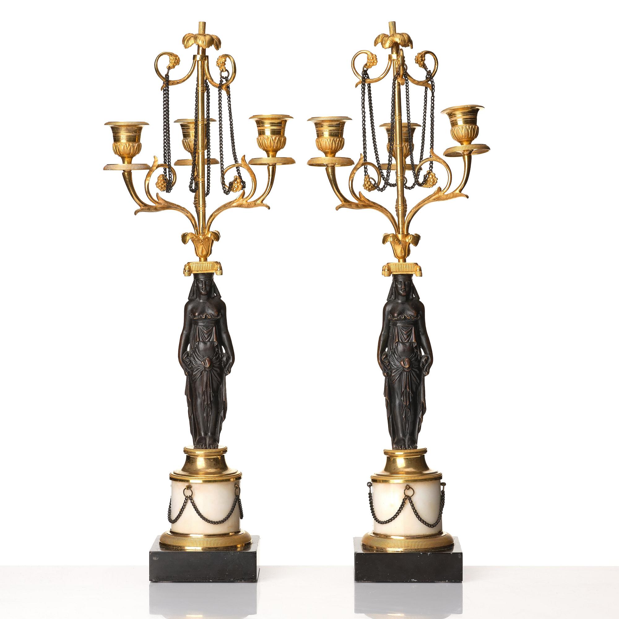 A pair of late Gustavian circa 1800 three-light candelabra, attributed to F L Rung.