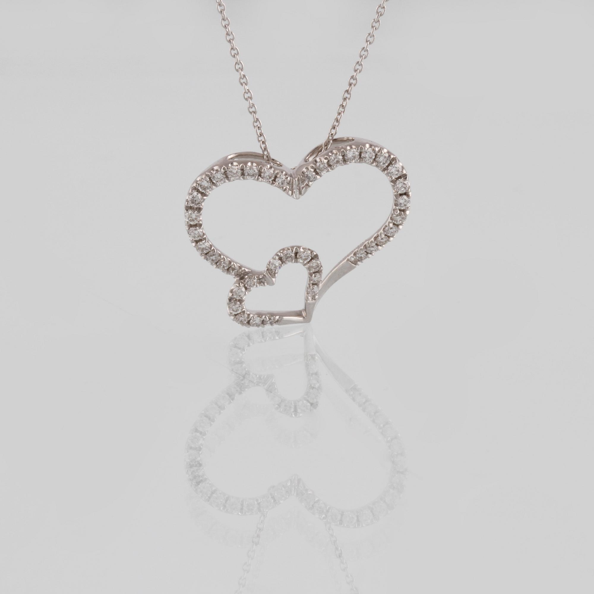 HÄNGE, 18K vitguld med briljantslipade diamanter ca 0.26 ct. Vikt 2,4 gram.