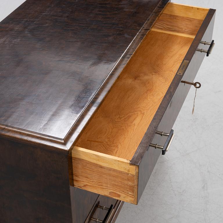A 1930's stained birch chest of drawers.