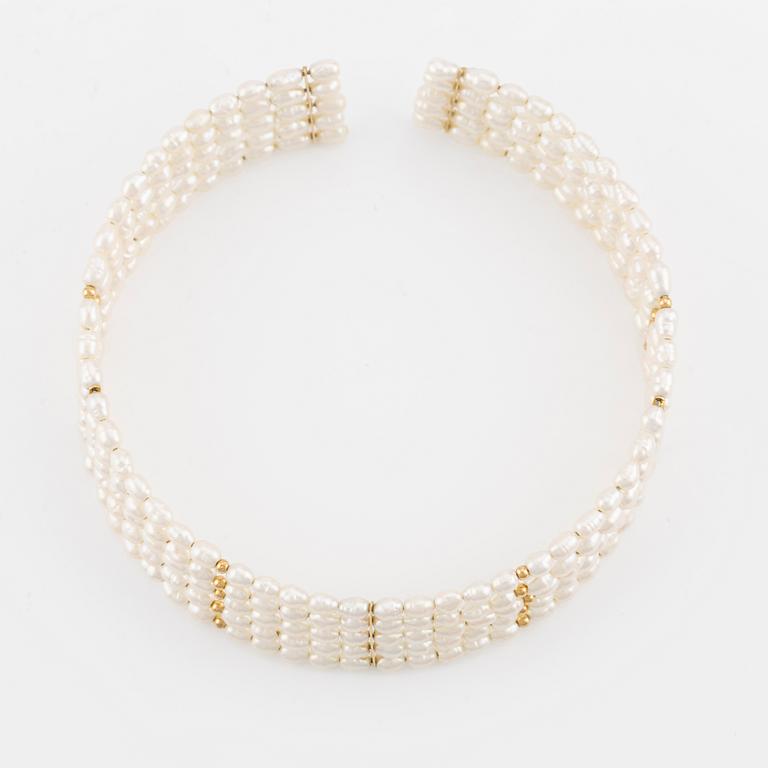 Five-row collar/choker with cultured freshwater pearls and 14K gold beads.