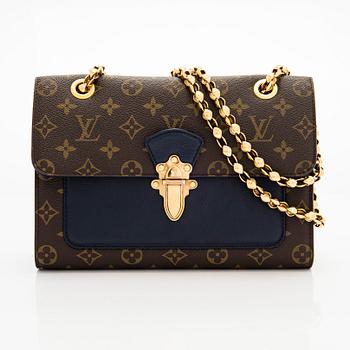 Louis Vuitton, a Monogram 'Victoire' bag.
