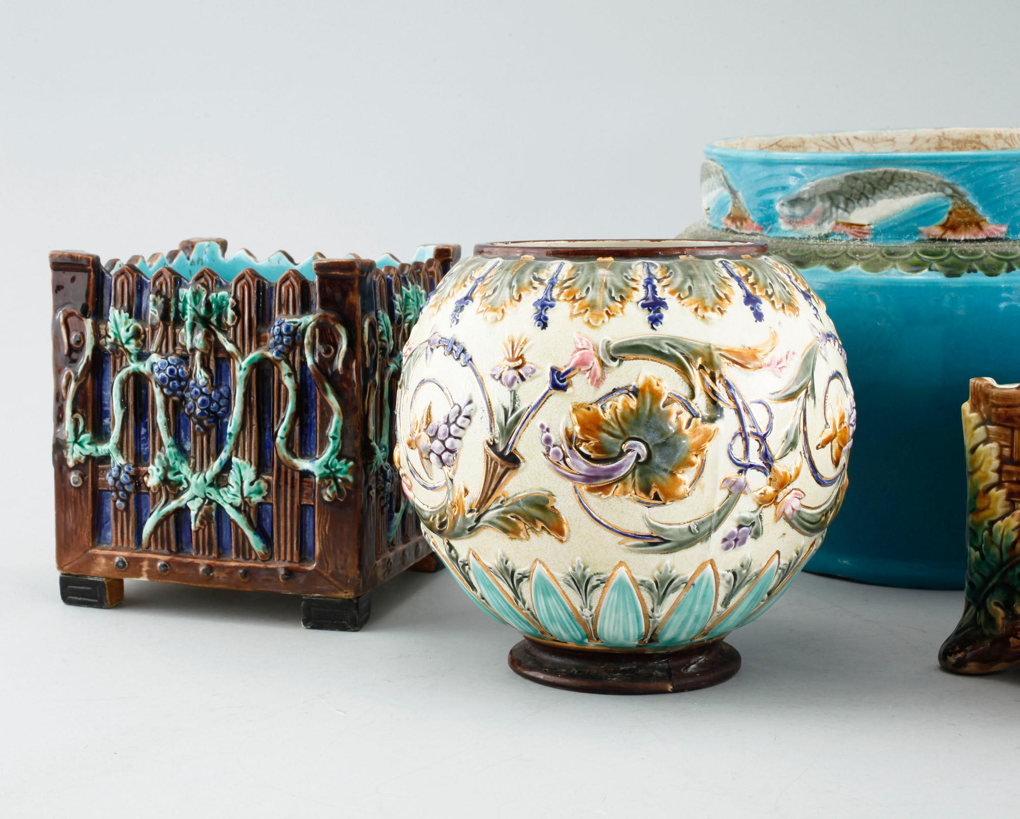 Four majolica pots, three marked Rörstrand, around year 1900.
