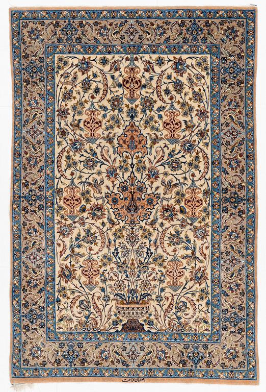 A rug, semi-antique, Esfahan, signed Ghena, ca 166 x 109 cm.