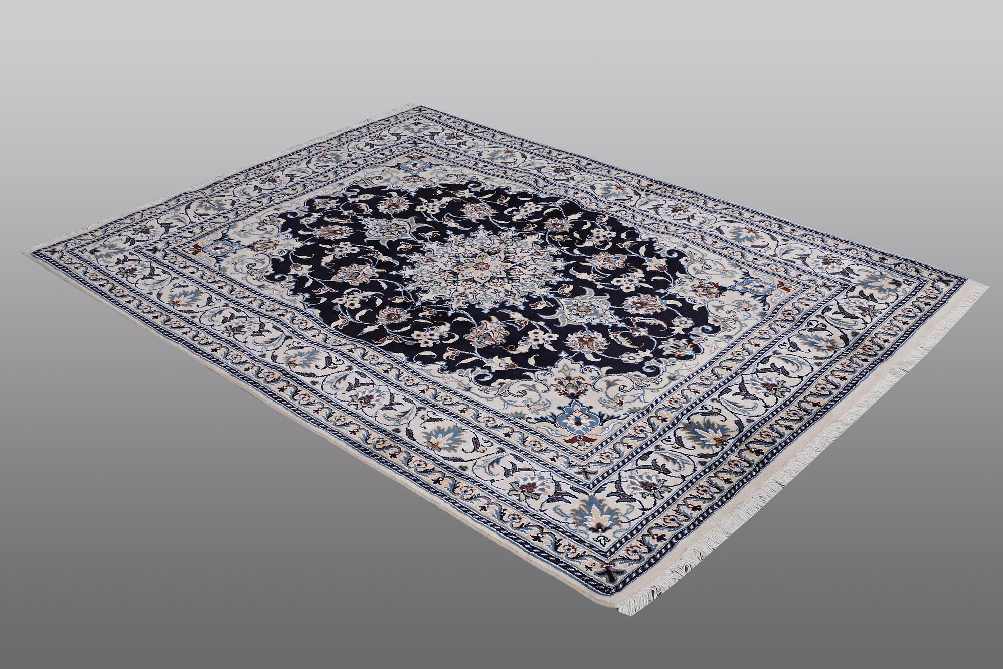 A carpet, Nain, part silk, ca 212 x 153 cm.