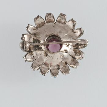 BROSCH, silver med lila och turkost glas samt markasiter, importstämplad, 1900-talets mitt. Vikt 9.0 g.