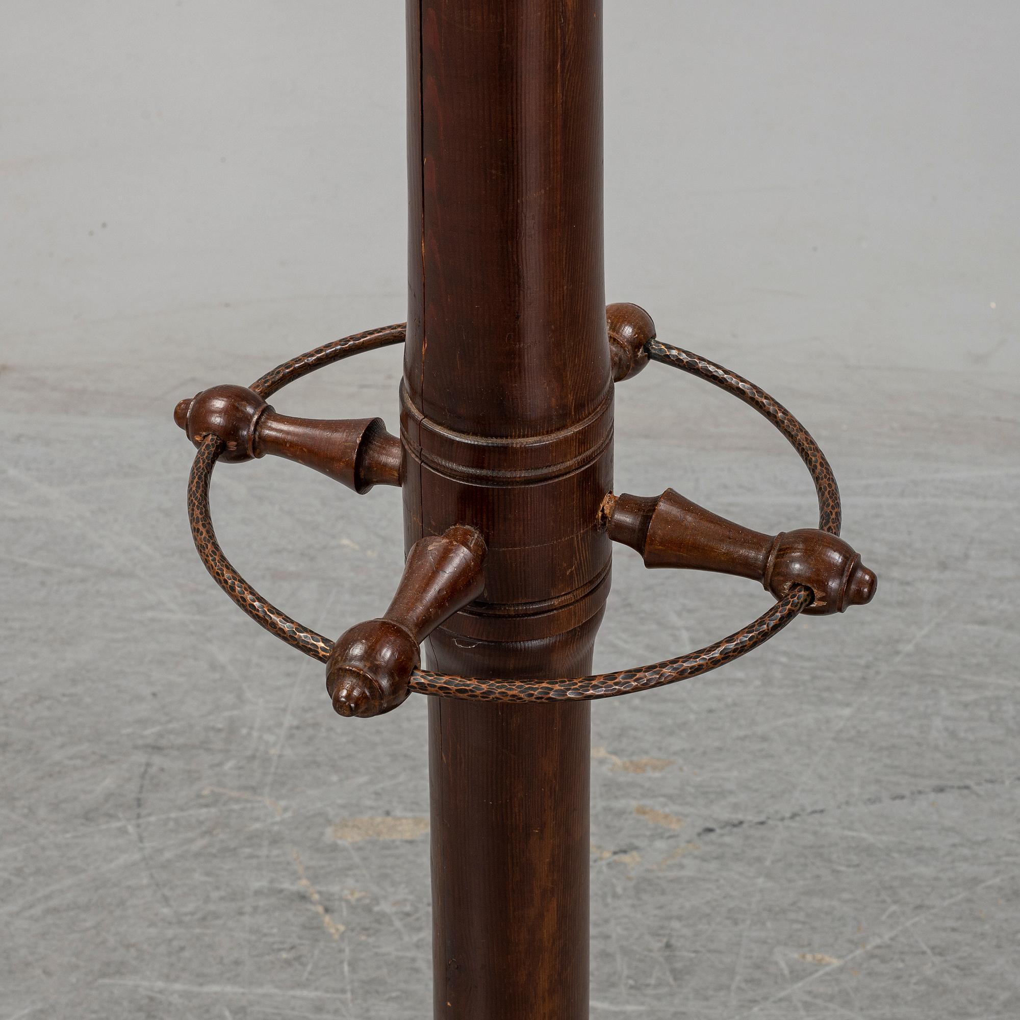 A stained pine clothes hanger, first half of the 20th century.