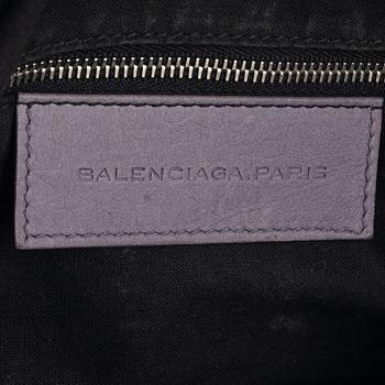 Balenciaga, a purple leather 'City' handbag.