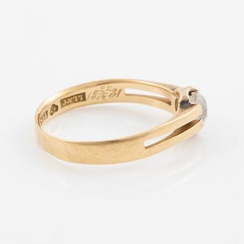 Ring 18K guld med en gammalslipad diamant.