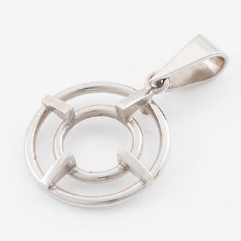 Brooch/pendant, 18K white gold with sapphire and brilliant-cut diamonds.