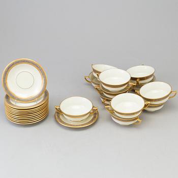 A SET OF 12 SOUP BOWLS AND PLATES, mid 20th century.