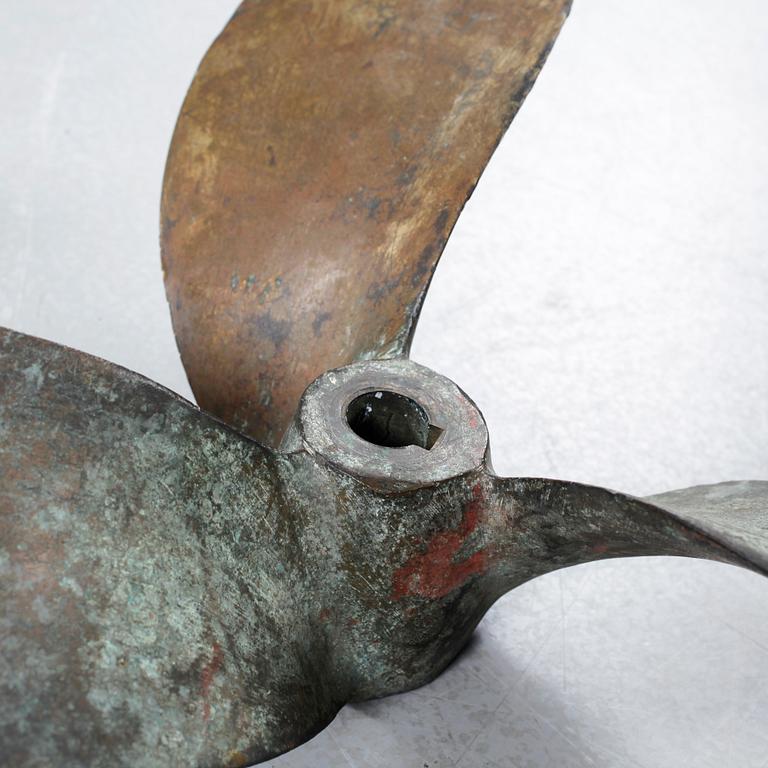 Four 20th century bronze propellers.