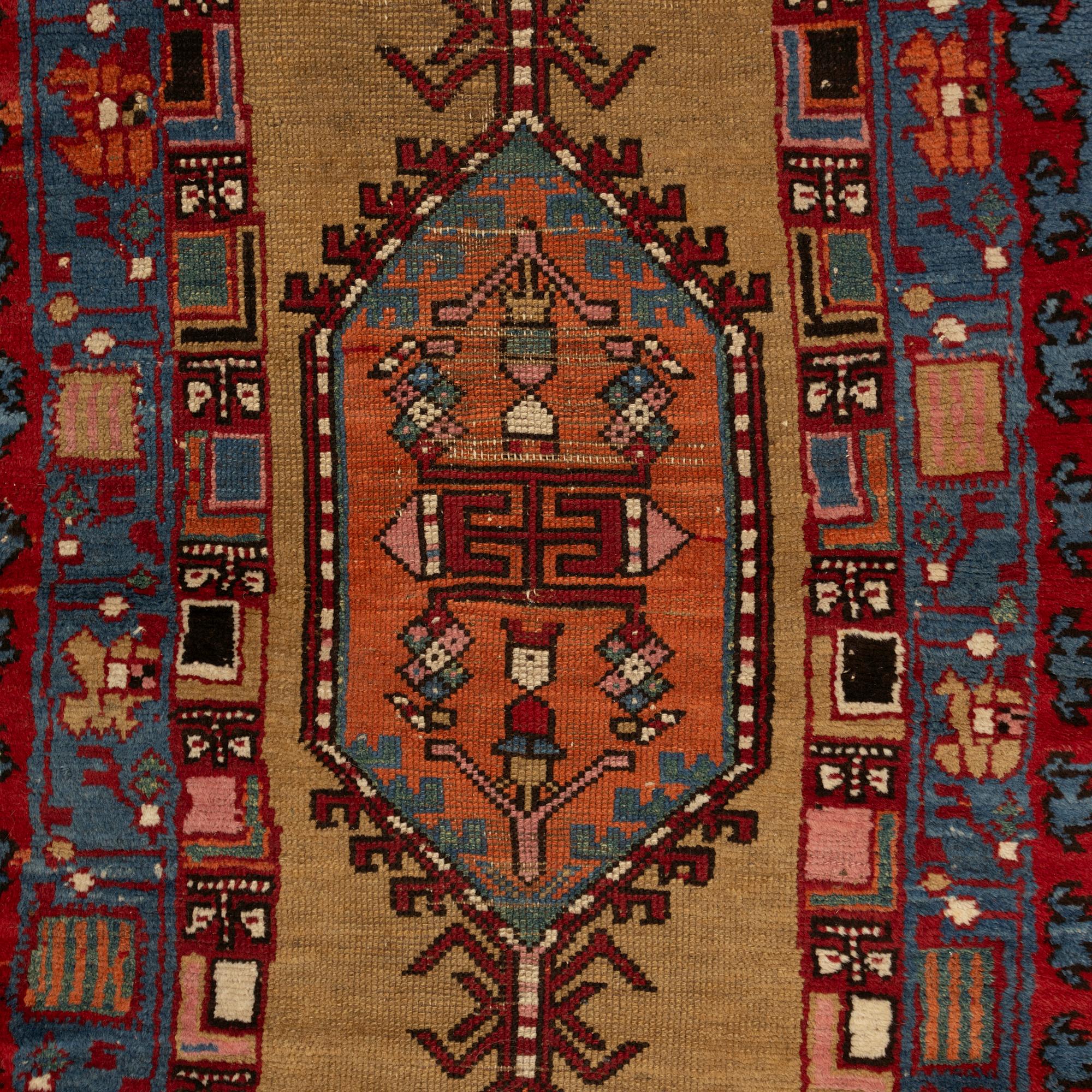 An antique Northwest Persian runner, c. 257 x 99 cm.