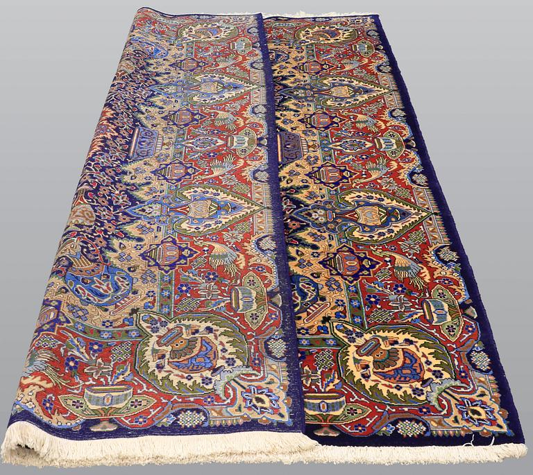 A carpet, Figural Kashmar, ca 315 x 203 cm.
