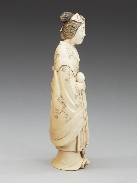 A Japanese Ivory figure of a lady, Meiji (1868-1912).