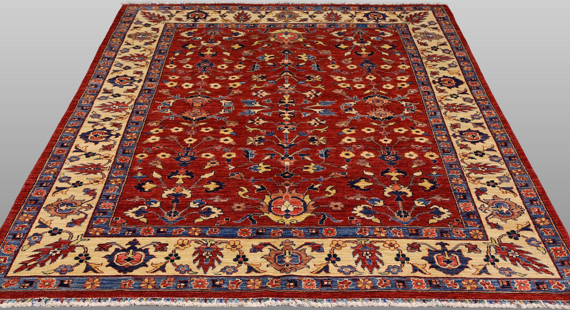 A rug, Ziegler design, approx. 246 x 177 cm.