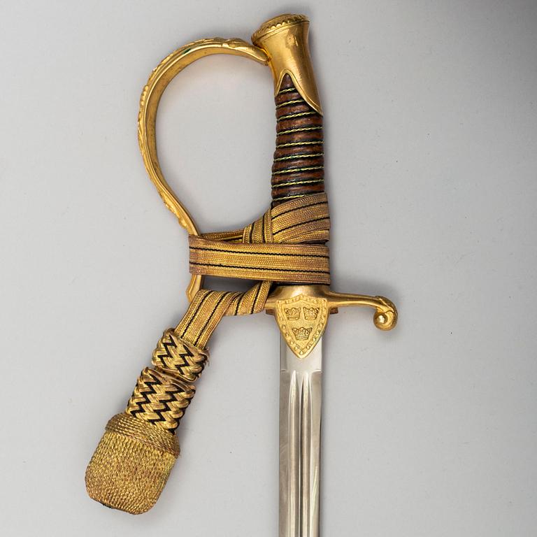 A Swedish artillery officer's sabre 1889 pattern with scabbard.