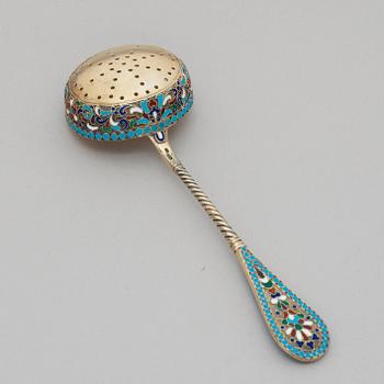A Russian early 20th century silver-gilt and enamel cane-spoon, unidentified makers mark Moscow 1899-1908.