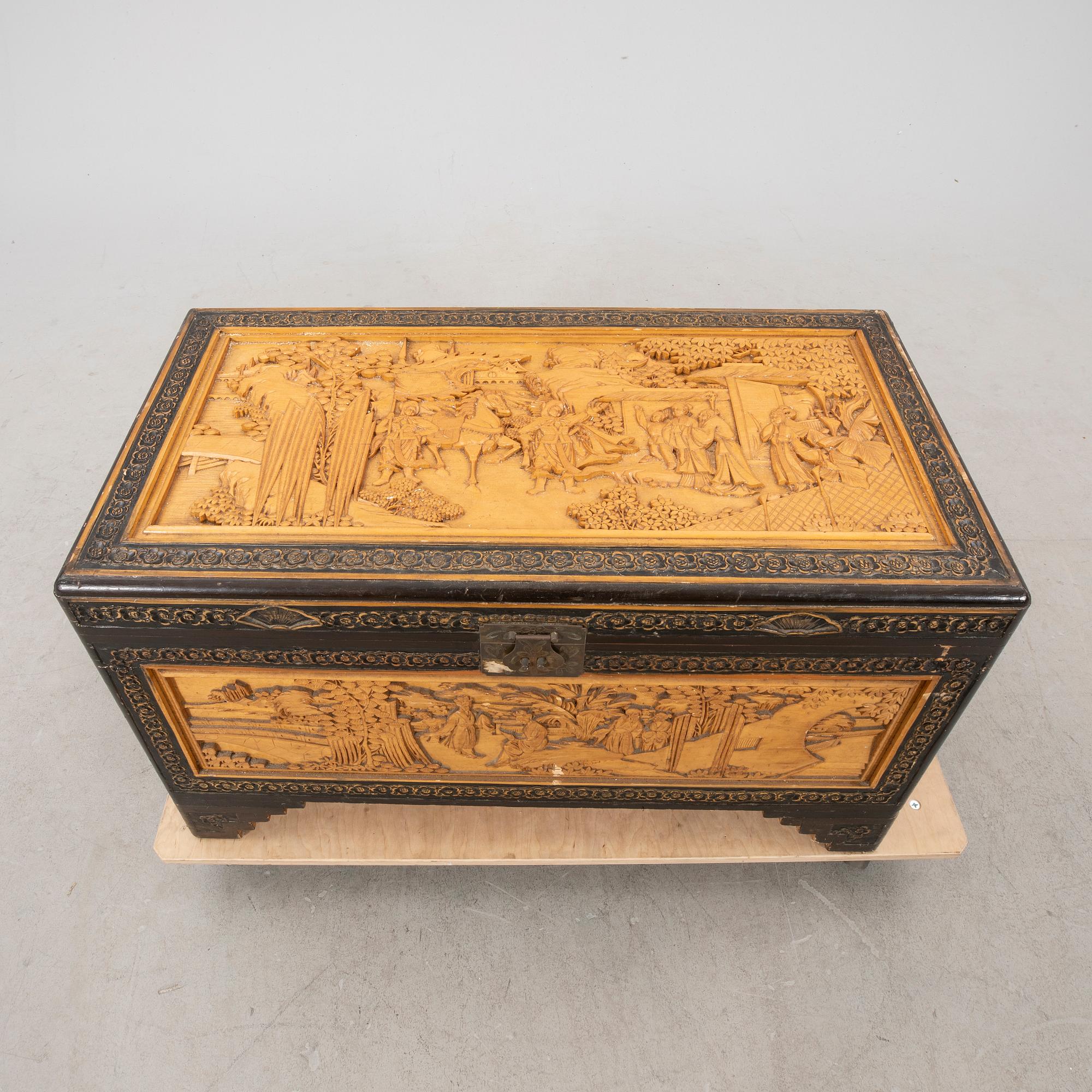 An Asian wooden coffin 20th century.
