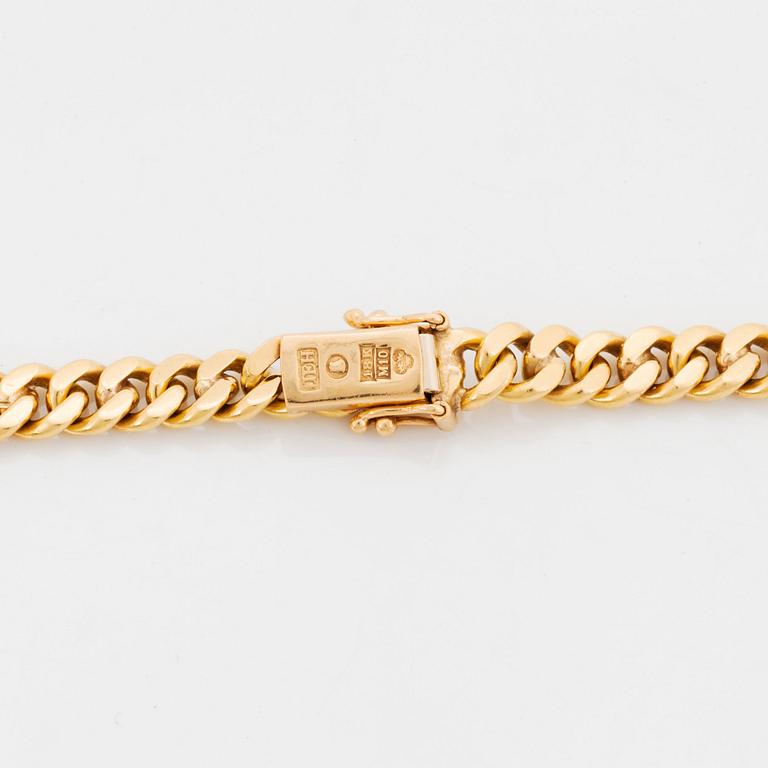 An 18K gold necklace by Jan Hellströmer.