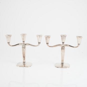 A pair of silver candlesticks, Swedish import marks, first half of the 20th Century.