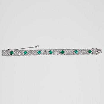 An emerald and brilliant-cut diamond bracelet, signed Cartier. Total carat weight of diamonds ca 5.70 cts. No 58436.