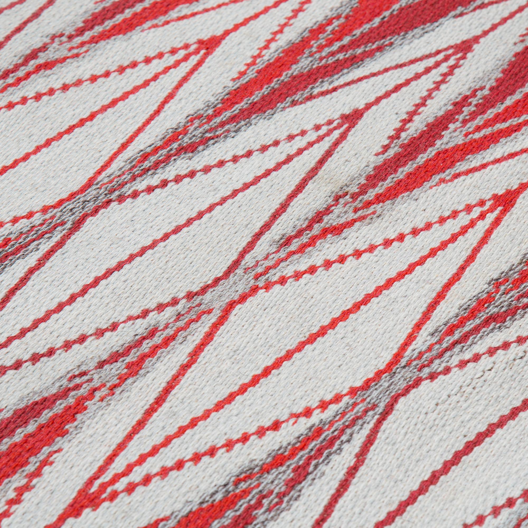 A machine wiwven carpet, designed by  Ingrid Dessau for Kasthall, around 202 x 143 cm.