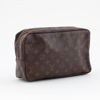 LOUIS VUITTON, a monogram canvas toiletry case.