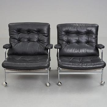 Bruno Mathsson, a pair of "Karin" easy chairs, DUX, Sweden, post 1969.