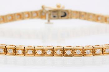 Tennis bracelet 18K gold with brilliant-cut diamonds approx 0,90 ct in total, length approx 19 cm.