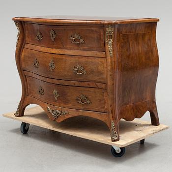 A 1700s rococo commode.