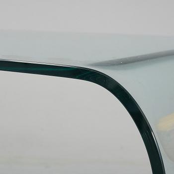 A mid 20th Century glass coffee table.
