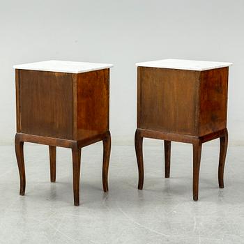 A pair of bedside tables, early 20th century.