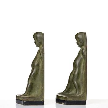 Axel Gute, a pair of green patinated metal bookends, Sweden, dated 1920.